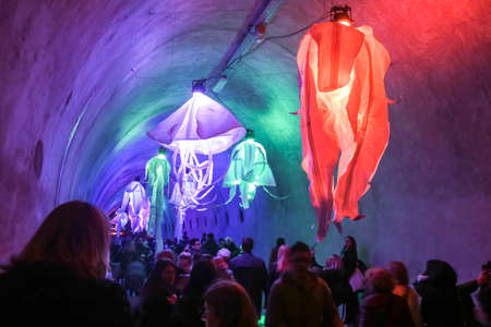 Zagreb, Croatia - 16 March, 2018 : Festival of lights. People walking through a lighted tunnel Gric with lighted colorful abstract chandeliers in the center of Zagreb.のeditorial素材