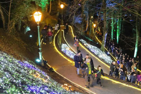 Zagreb, Croatia - 16 March, 2018 : People walking on iluminated like flowers in a park in Vrazs promenade in upper town of Zagreb.のeditorial素材