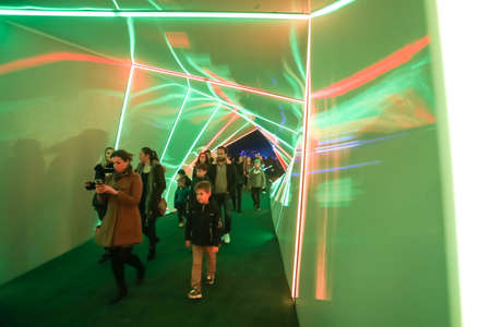 Zagreb, Croatia - 16 March, 2018 : Festival of lights. People walking through a lighted tunnel with colorful neon lights in the center of Zagreb.のeditorial素材