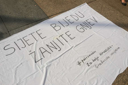 Zagreb, Croatia - 14. September, 2018 : Sign on a protest against the ruling political party Hdz and the opposition SDP on Ban Jelacic Square in Zagreb, Croatia.のeditorial素材