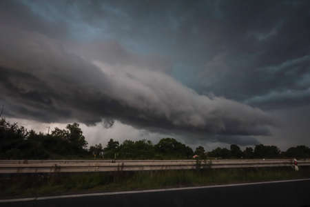 Black storm clouds over the highway in Zagreb, Croatia.の写真素材