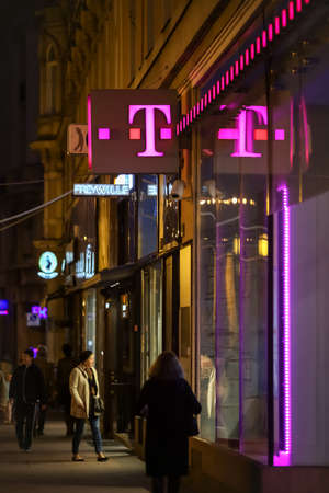 Zagreb, Croatia - 19 March, 2017 : People pasing by T Com sign outside of the shop in downtown of Zagreb, Croatia.のeditorial素材