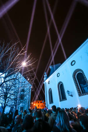 Zagreb, Croatia - 19 March, 2017 : Festival of lights in Zagreb, Croatia. People looking at illuminated buildings and presentation of light beams on the upper town in Zagreb, Croatia.のeditorial素材