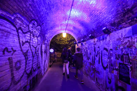 Zagreb, Croatia - 19 March, 2017 : Festival of lights in Zagreb, Croatia. People walking through a illuminated tunnel in the center of Zagreb.のeditorial素材