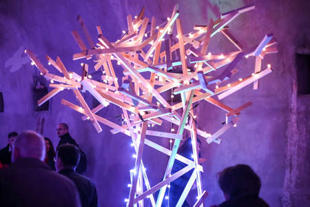 Zagreb, Croatia - 19 March, 2017 : Festival of lights in Zagreb, Croatia. People walking through a lighted tunnel Gric with lighted colorful wood shaped sculpture in the center of Zagreb.のeditorial素材