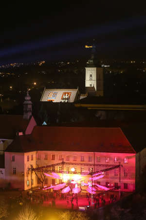 Zagreb, Croatia - 24 March, 2019 : Festival of lights in Zagreb, Croatia. View of the lighting installations on a plateau of Klovicevi palaces in the upper town with St. Mark Church in the background.のeditorial素材