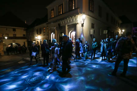 Zagreb, Croatia - 24 March, 2019 : Festival of lights in Zagreb, Croatia. People walk down a lighted street in the upper town during the night.のeditorial素材