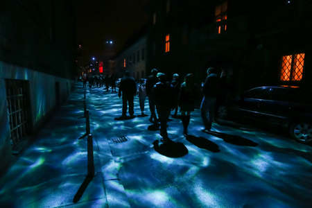 Zagreb, Croatia - 24 March, 2019 : Festival of lights in Zagreb, Croatia. People walk down a lighted street in the upper town during the night.のeditorial素材