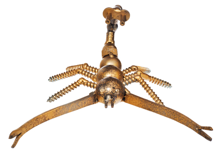 Handmade from car and motorcycle parts, scorpion. Arachnid made of motor bearing elements, drive chain, poultry, screws and other mechanical elements. Object isolated on a white background.の写真素材