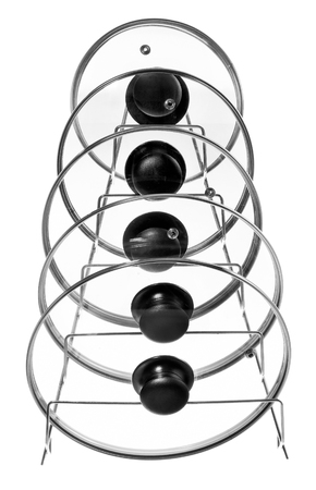 Kitchen hanger with glass lids for cooking pots. Hanger suitable for hanging on cupboards, kitchen rails. Made of aluminum, silver wire, isolated on a white background.の写真素材