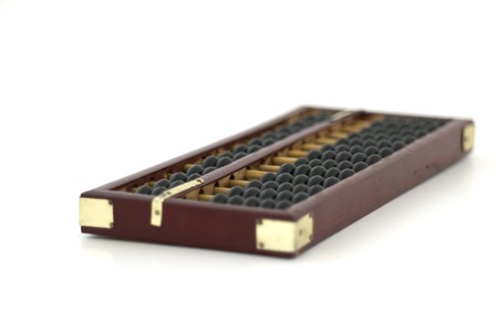 old wooden abacus on white backgroundの写真素材