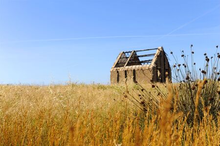 abandoned fisherman hut in a mediterranean islandの写真素材