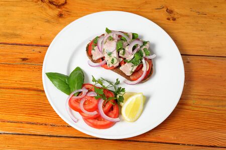 dish completed with marinated tuna fish sandwichの写真素材