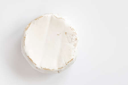 head of tasty camembert cheese isolated on white, brie type of cheese, french cheeseの写真素材