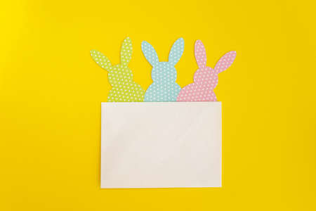 funny handmade easter rabbits card, flat lay, greeting card template, minimal concept of Easter,...