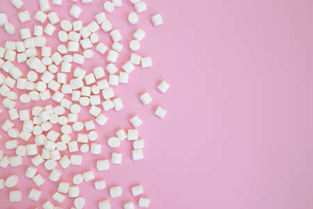 white mini marshmallows background frame, copy space for text, top viewの写真素材