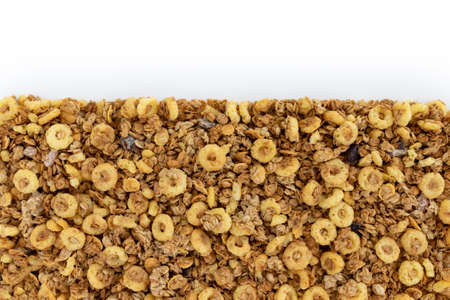frame of homemade granola with copy space for text isolated on white background, concept healthy...