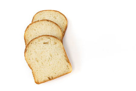 three slices wheat bread and empty space for text isolated on white background, fresh wheat bread,...