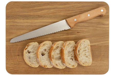 wooden board with tasty cut bread and knife isolated on white, top view, fresh delicious homemade...