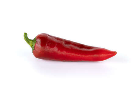 red bell pepper isolated on white background, long sweet pepper, fresh vegetables, side view