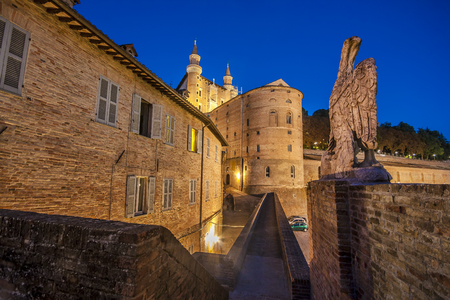 Narrow alley in the center of the city of Urbino in the eveningのeditorial素材