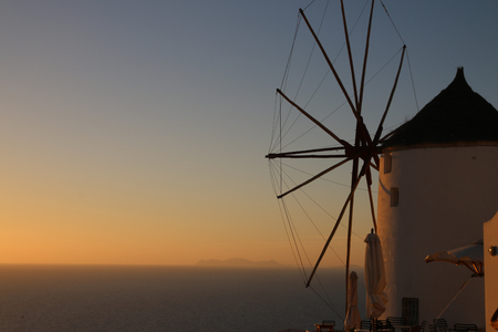famous sunset of oia from the windmillの写真素材