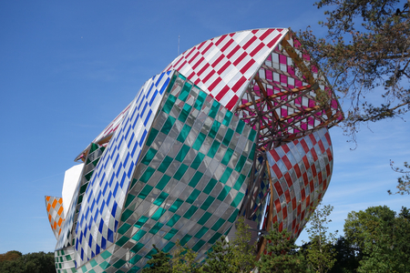 Modern glass building with sails in parisの写真素材
