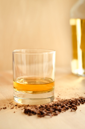 Glass of whiskey and chocolateの写真素材