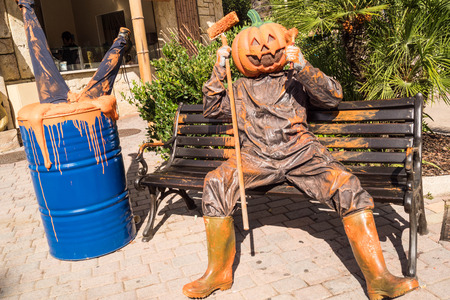 a dummie with pumpkin head at gardaland park in verona italy for halloween 2017のeditorial素材