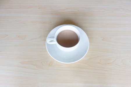 cup of coffee on wooden tableの写真素材