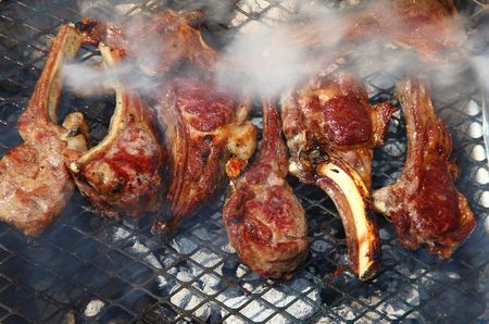 Tasty barbecue ribs on a grillの写真素材