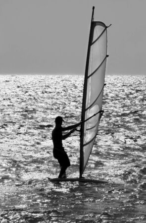 Windsurfer training in open sea. の写真素材