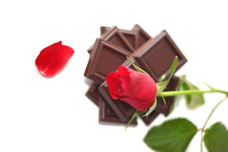 Red Rose with chocolate on whiteの写真素材