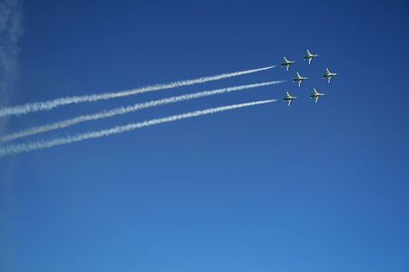 group of six airplanes making formation
