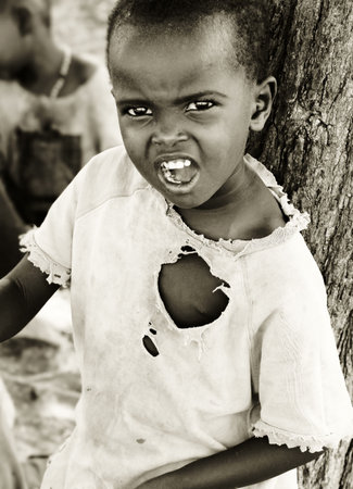 Portrait of African child expressing angryness. Editorial use onlyのeditorial素材