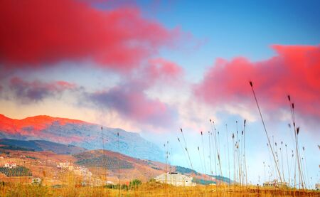 Dramatic sunset in  the mountain villageの写真素材
