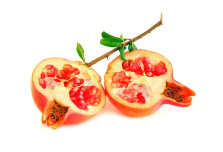 Red pomegranates isolated on white backgroundの写真素材