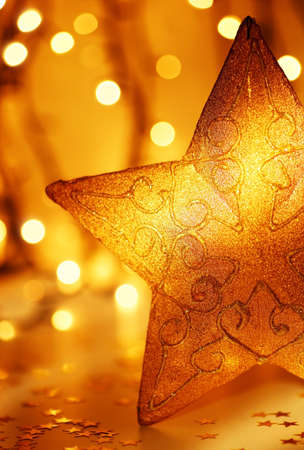 Christmas decoration, holiday background with golden lights