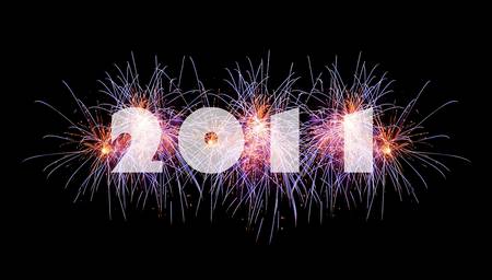 Black New Year holiday background with fireworks & 2011 textの写真素材