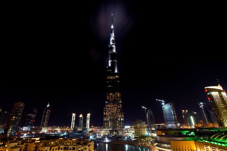 Dubai downtown night scene with city lightsの写真素材