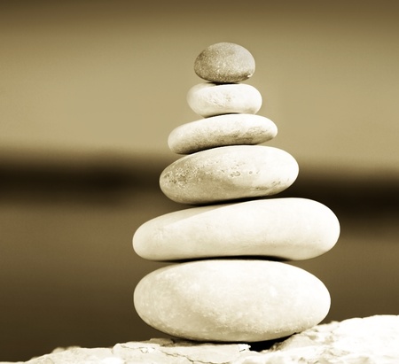 Zen balance stones sepia toned, conceptual image of relaxation & vacationの写真素材