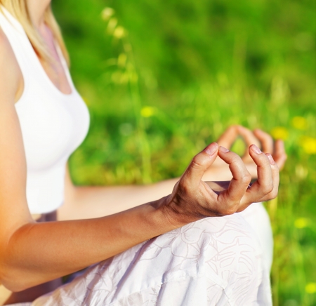 Yoga meditation outdoor, healthy female in peace, soul & mind zen balance conceptの写真素材