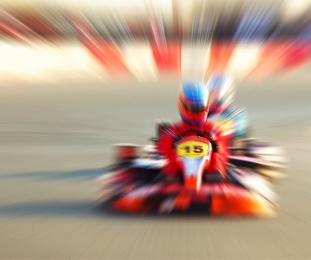 Abstract red slow motion speed background, selective focus on race kart, karting competition, extreme sportの写真素材
