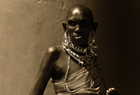 Portrait of an African lady that dressed traditionally, sepia toned