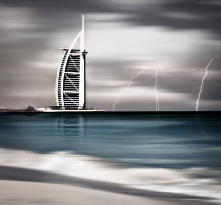 DUBAI, UAE - NOV 21: Burj Al Arab is 321m, second tallest hotel in the world, luxury hotel stands on an artificial island, November 21,2009 Jumeirah beach, Dubai, United Arab Emiratesのeditorial素材