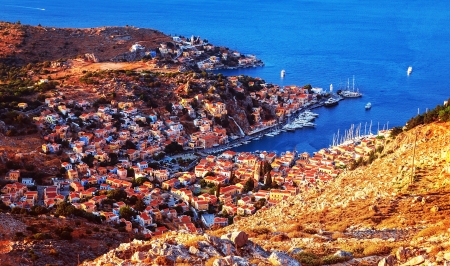 Coastal town, Europe, Greece, Symi, beautiful cityscape, Mediterranean sea, many little houses, panoramic landscape, travel conceptの写真素材