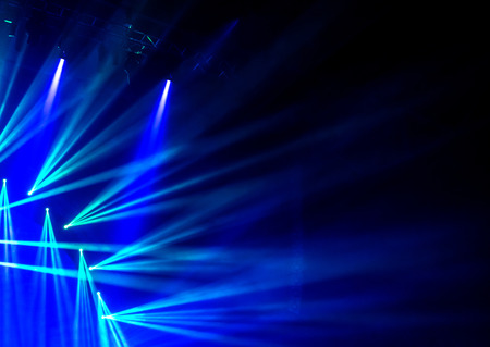 Blue stage light, abstract background, illuminated dance club, night performance, laser...