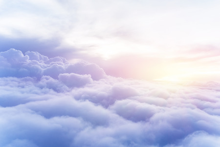 Sunny sky abstract background, beautiful cloudscape, on the heaven, view over white fluffy clouds, freedom conceptの写真素材