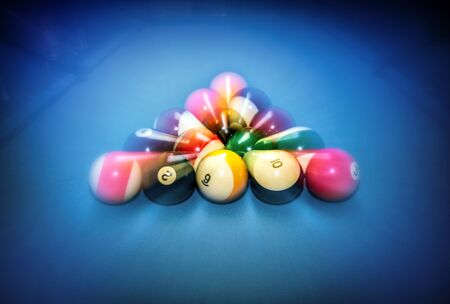 Billiard table vintage background, beginning of the game, slow motion technique, soft focus effect, hobby and sport conceptの写真素材