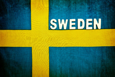 Flag of Sweden, national symbol, abstract background with space for text, patriotic wallpaper, background for football fansの写真素材
